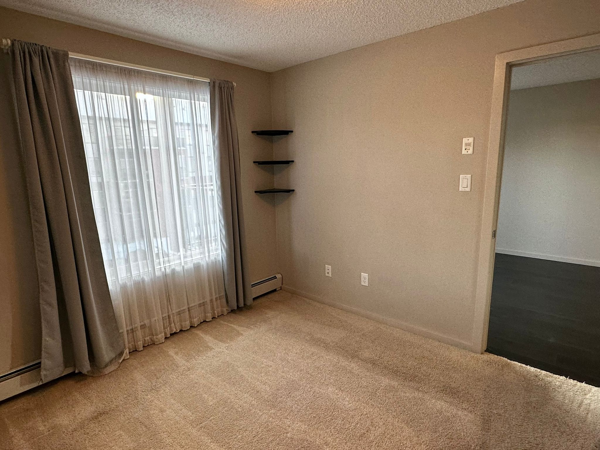 Finished suite living room Edmonton, clean paint dark trim