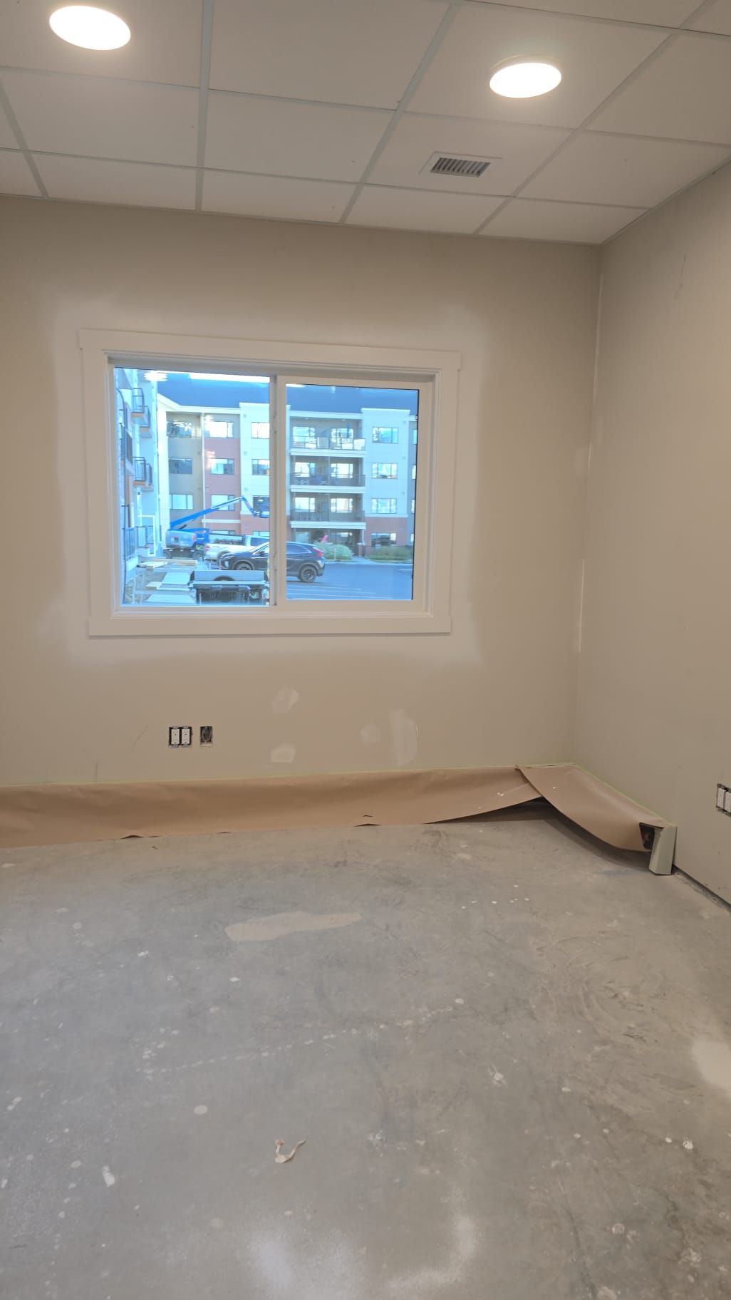 Wallpaper removal and drywall repair Edmonton office